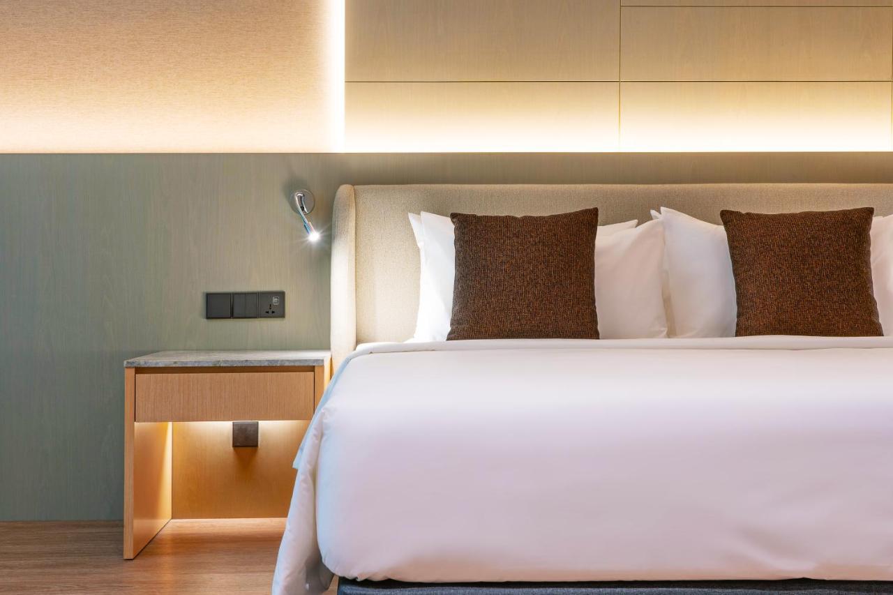 פטלין ג'איה M World Hotel Formerly Known As Avante Hotel מראה חיצוני תמונה A bed in a hotel room
